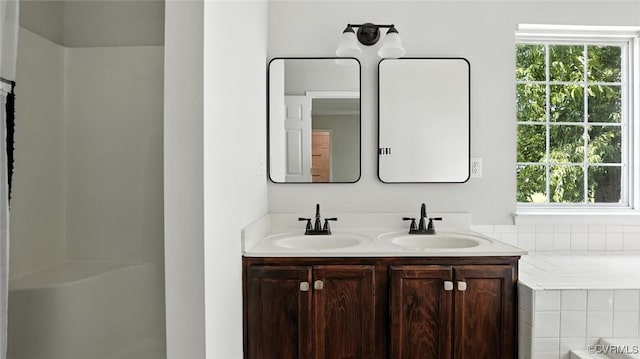 3208 Warm Springs Way, Henrico, VA 23223 - full bathroom featuring double vanity, healthy amount of natural light, and a tub to relax in