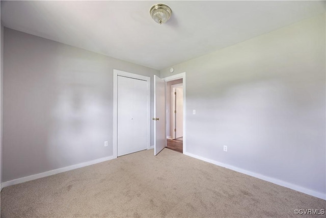 10324 Lamore Dr, Disputanta, VA 23842 - spare room with light carpet and baseboards