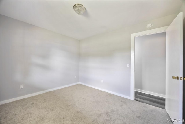 10324 Lamore Dr, Disputanta, VA 23842 - carpeted empty room with baseboards and a smoke detector