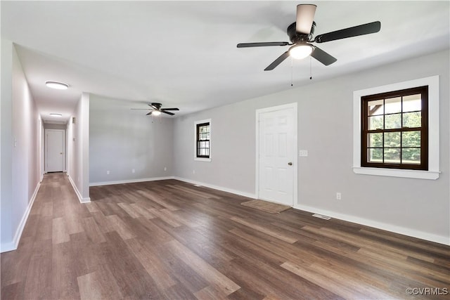 10324 Lamore Dr, Disputanta, VA 23842 - spare room with dark wood finished floors and ceiling fan