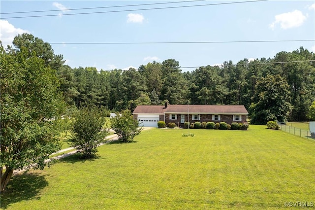 10324 Lamore Dr, Disputanta, VA 23842 - single story home featuring a view of trees and a garage