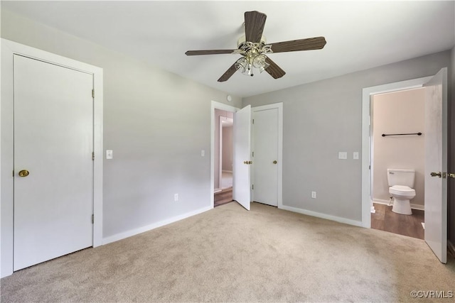 10324 Lamore Dr, Disputanta, VA 23842 - unfurnished bedroom with carpet flooring, ensuite bath, and a ceiling fan