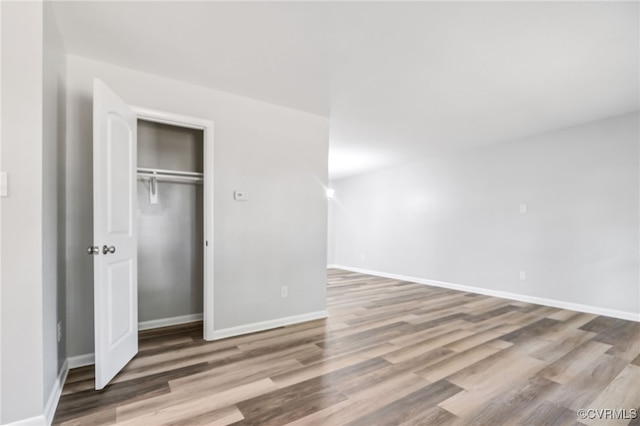 6512 N Stevens Hollow Dr, Chesterfield, VA 23832 - unfurnished bedroom with wood finished floors and a closet