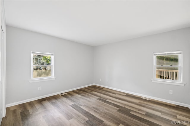 6512 N Stevens Hollow Dr, Chesterfield, VA 23832 - unfurnished room featuring healthy amount of natural light and wood finished floors