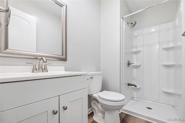 6512 N Stevens Hollow Dr, Chesterfield, VA 23832 - bathroom featuring vanity, wood finished floors, and a shower