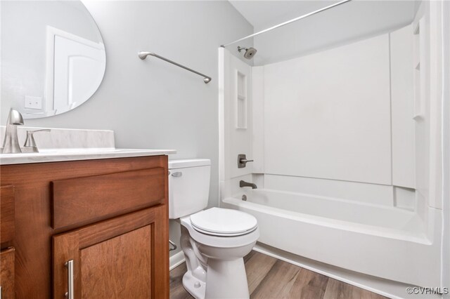 6512 N Stevens Hollow Dr, Chesterfield, VA 23832 - bathroom featuring vanity, washtub / shower combination, and wood finished floors
