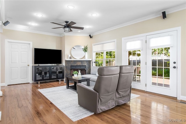 1204 Bowden Rd, Henrico, VA 23229 - living area with a ceiling fan, crown molding, wood-type flooring, recessed lighting, and a fireplace