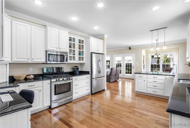 1204 Bowden Rd, Henrico, VA 23229 - kitchen featuring stainless steel appliances, crown molding, dark countertops, white cabinetry, and recessed lighting