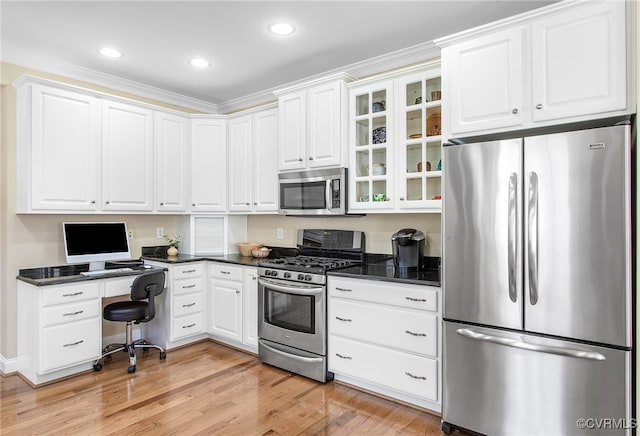 1204 Bowden Rd, Henrico, VA 23229 - kitchen with appliances with stainless steel finishes, dark countertops, glass insert cabinets, white cabinets, and recessed lighting