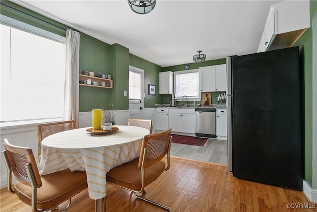 202 Larne Ave, Richmond, VA 23224 - dining room featuring light wood-type flooring