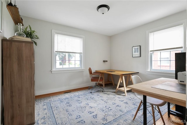 202 Larne Ave, Richmond, VA 23224 - office area featuring healthy amount of natural light and wood finished floors