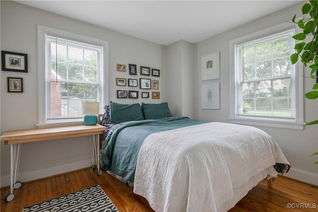 202 Larne Ave, Richmond, VA 23224 - bedroom with wood finished floors and multiple windows