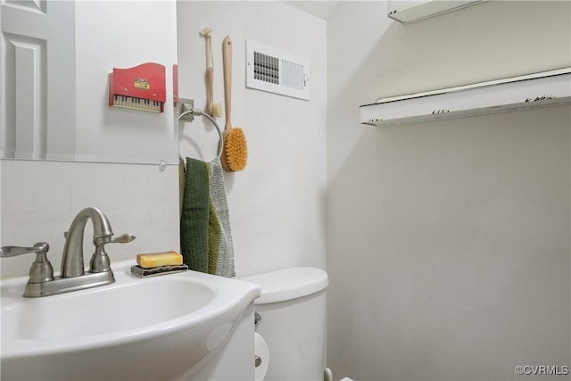 202 Larne Ave, Richmond, VA 23224 - bathroom featuring a sink and toilet