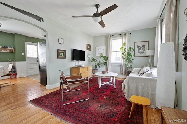 202 Larne Ave, Richmond, VA 23224 - living area featuring arched walkways, ceiling fan, and wood finished floors