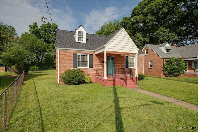 202 Larne Ave, Richmond, VA 23224 - new england style home featuring brick siding and a shingled roof