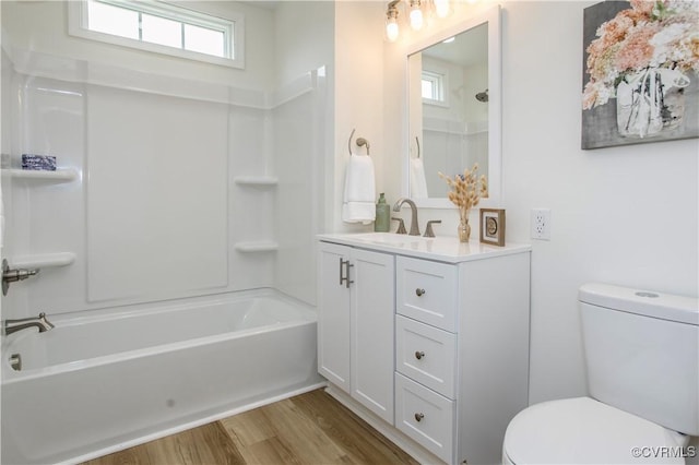 25713 Simmons Ave, North Dinwiddie, VA 23803 - bathroom featuring vanity, wood finished floors, and shower / bath combination