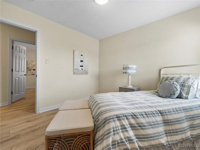 621 Fort Lowry Ln, Dunnsville, VA 22454 - bedroom with wood finished floors and baseboards