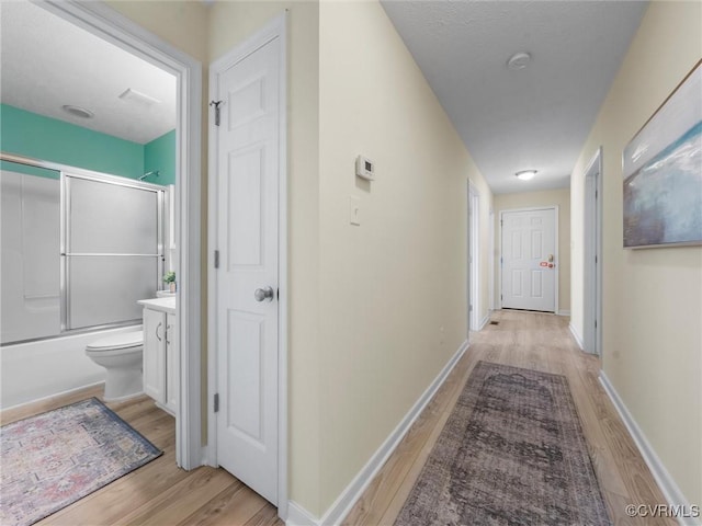 621 Fort Lowry Ln, Dunnsville, VA 22454 - hall featuring light wood-style flooring