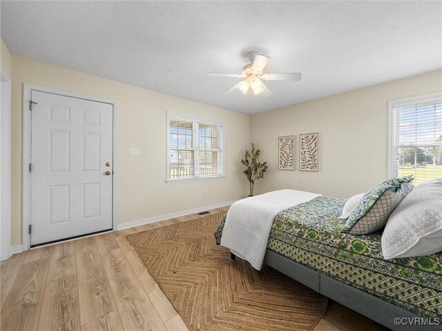 621 Fort Lowry Ln, Dunnsville, VA 22454 - bedroom featuring light wood finished floors and a ceiling fan