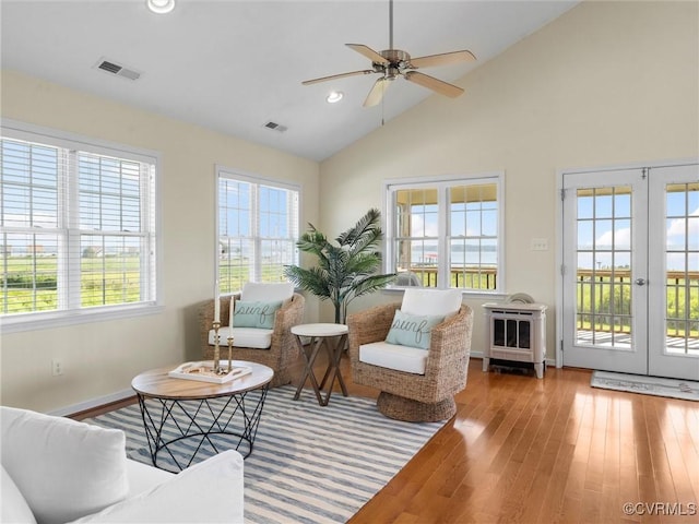 621 Fort Lowry Ln, Dunnsville, VA 22454 - living room with plenty of natural light, wood finished floors, ceiling fan, high vaulted ceiling, and recessed lighting