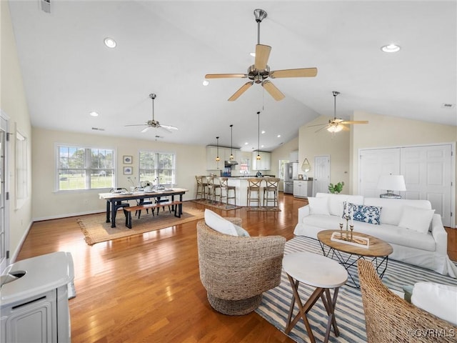 621 Fort Lowry Ln, Dunnsville, VA 22454 - living room with lofted ceiling, light wood finished floors, ceiling fan, and recessed lighting