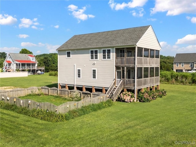 621 Fort Lowry Ln, Dunnsville, VA 22454 - rear view of property featuring a sunroom, a shingled roof, and stairway