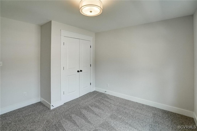2500 Madison Station Ct, Henrico, VA 23233 - unfurnished bedroom featuring dark colored carpet and a closet