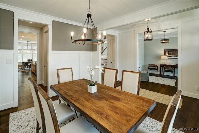 2500 Madison Station Ct, Henrico, VA 23233 - dining space featuring a chandelier, dark wood-style floors, stairway, ornamental molding, and a decorative wall