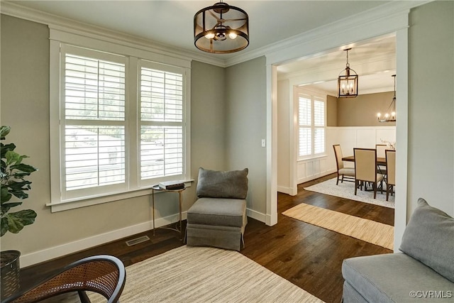 2500 Madison Station Ct, Henrico, VA 23233 - living area with a chandelier, dark wood finished floors, and crown molding