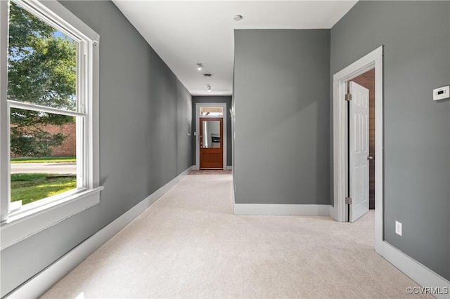 2909 Hull St, Richmond, VA 23224 - corridor featuring light colored carpet and healthy amount of natural light