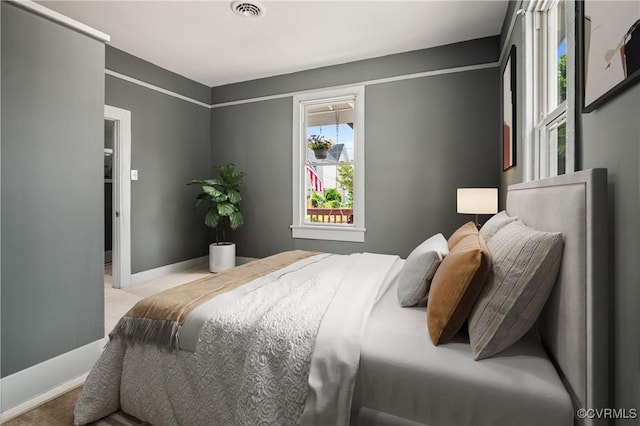 2909 Hull St, Richmond, VA 23224 - bedroom with baseboards and carpet flooring