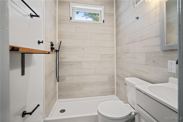 2909 Hull St, Richmond, VA 23224 - full bath featuring a stall shower, vanity, and wooden walls