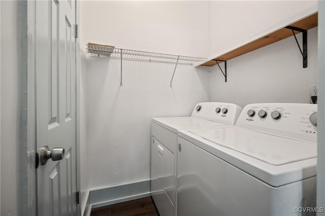 2909 Hull St, Richmond, VA 23224 - laundry area with washing machine and clothes dryer and wood finished floors