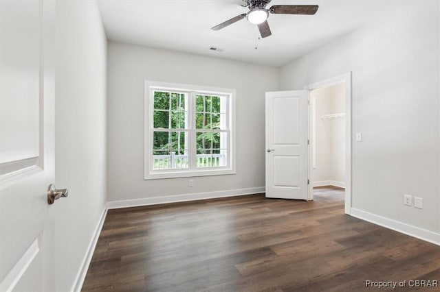 5883 Mill Race Pl, Gloucester, VA 23061 - spare room featuring a ceiling fan and dark wood-style floors
