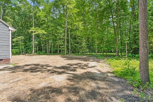 5883 Mill Race Pl, Gloucester, VA 23061 - view of yard with a view of trees