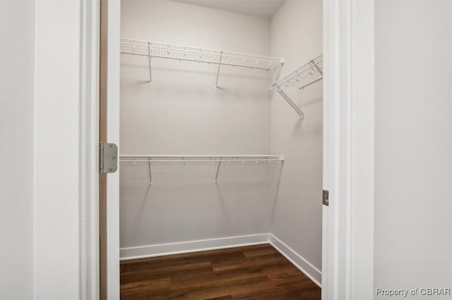 5883 Mill Race Pl, Gloucester, VA 23061 - spacious closet with dark wood-style flooring