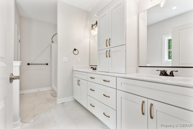 5883 Mill Race Pl, Gloucester, VA 23061 - full bathroom featuring marble finish flooring, double vanity, and a shower