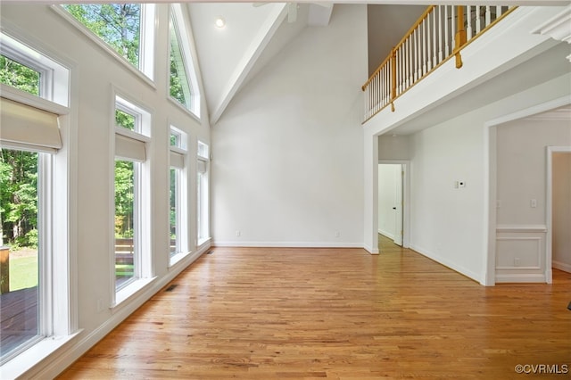 3007 Tranbycroft Way, Sandy Hook, VA 23153 - unfurnished living room with light wood-style flooring and high vaulted ceiling