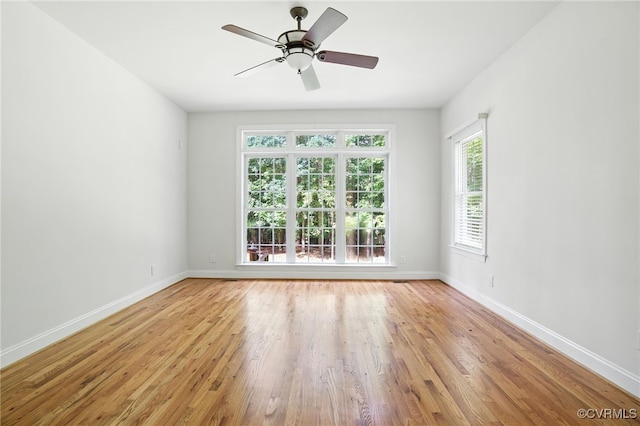3007 Tranbycroft Way, Sandy Hook, VA 23153 - empty room with light wood finished floors and a ceiling fan
