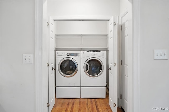 3007 Tranbycroft Way, Sandy Hook, VA 23153 - washroom with washer and dryer and wood finished floors