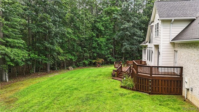 3007 Tranbycroft Way, Sandy Hook, VA 23153 - view of green lawn with a wooden deck