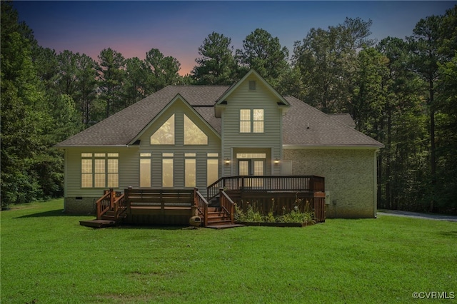 3007 Tranbycroft Way, Sandy Hook, VA 23153 - back of house at dusk featuring a lawn, a shingled roof, a deck, and crawl space