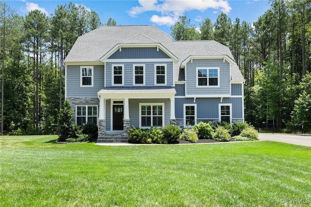 12613 Capernwray Ter, Chesterfield, VA 23838 - craftsman-style house with stone siding, a porch, a front yard, and a shingled roof