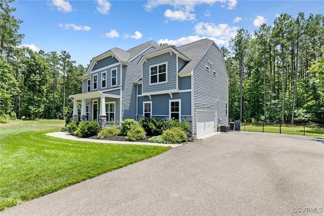 12613 Capernwray Ter, Chesterfield, VA 23838 - view of front of property with asphalt driveway, an attached garage, and stone siding