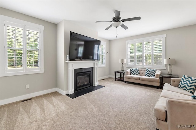 12613 Capernwray Ter, Chesterfield, VA 23838 - living room featuring carpet floors, ceiling fan, and a fireplace with flush hearth