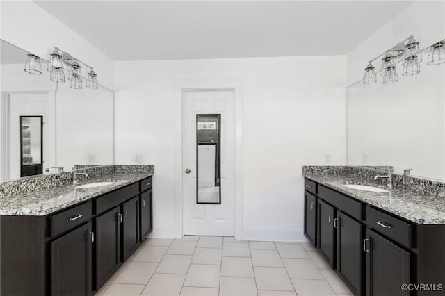 12613 Capernwray Ter, Chesterfield, VA 23838 - bathroom with two vanities and tile patterned floors