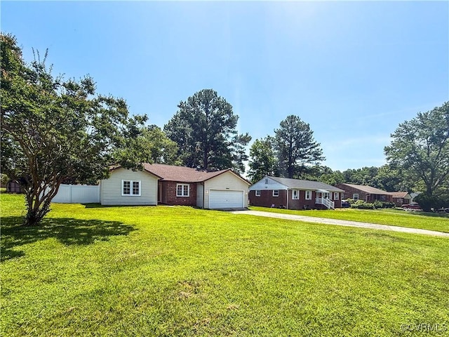 7908 Capistrano Dr, Henrico, VA 23227 - ranch-style house featuring driveway, an attached garage, and brick siding
