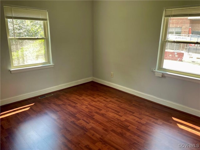 3535 Hanover Ave Unit B, Richmond, VA 23221 - unfurnished room featuring plenty of natural light and dark wood-style floors