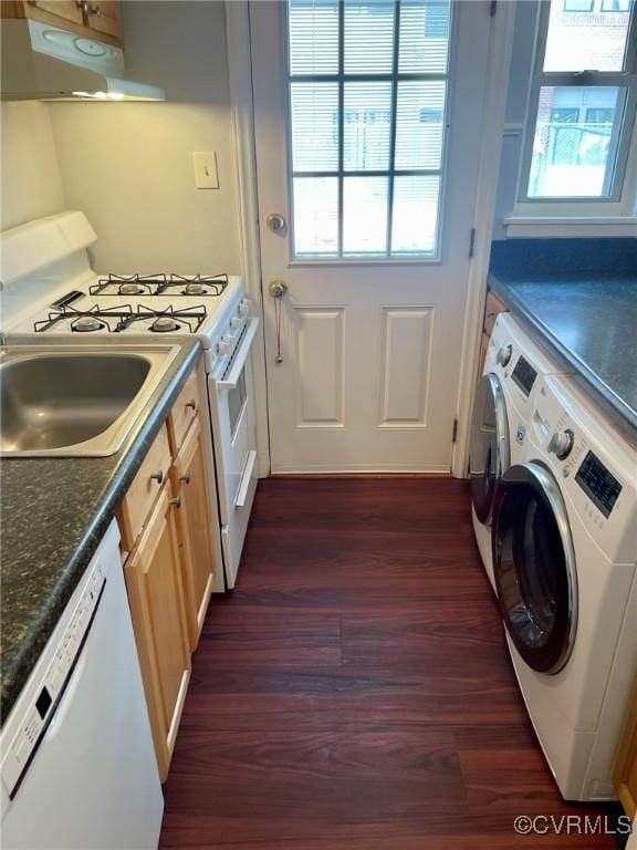 3535 Hanover Ave Unit B, Richmond, VA 23221 - kitchen featuring under cabinet range hood, washer / dryer, white appliances, dark wood-style flooring, and plenty of natural light