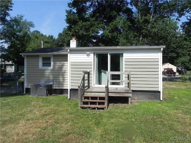 6325 Maple Rd, Quinton, VA 23141 - back of property featuring a chimney and a wooden deck